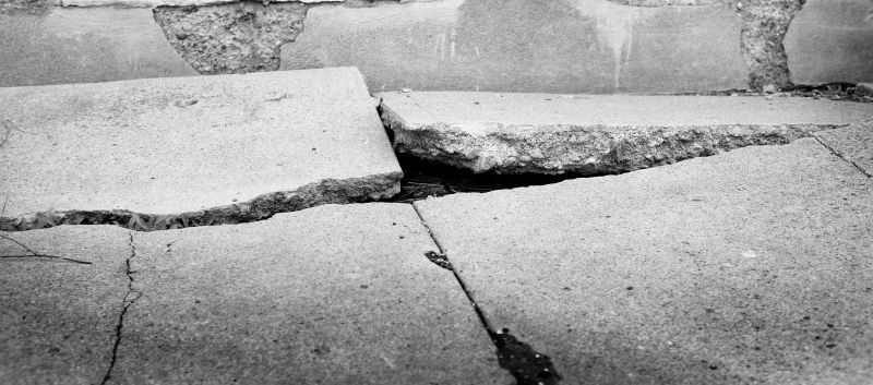 Cracks, Spalling, And Settling In Concrete Patios Explained